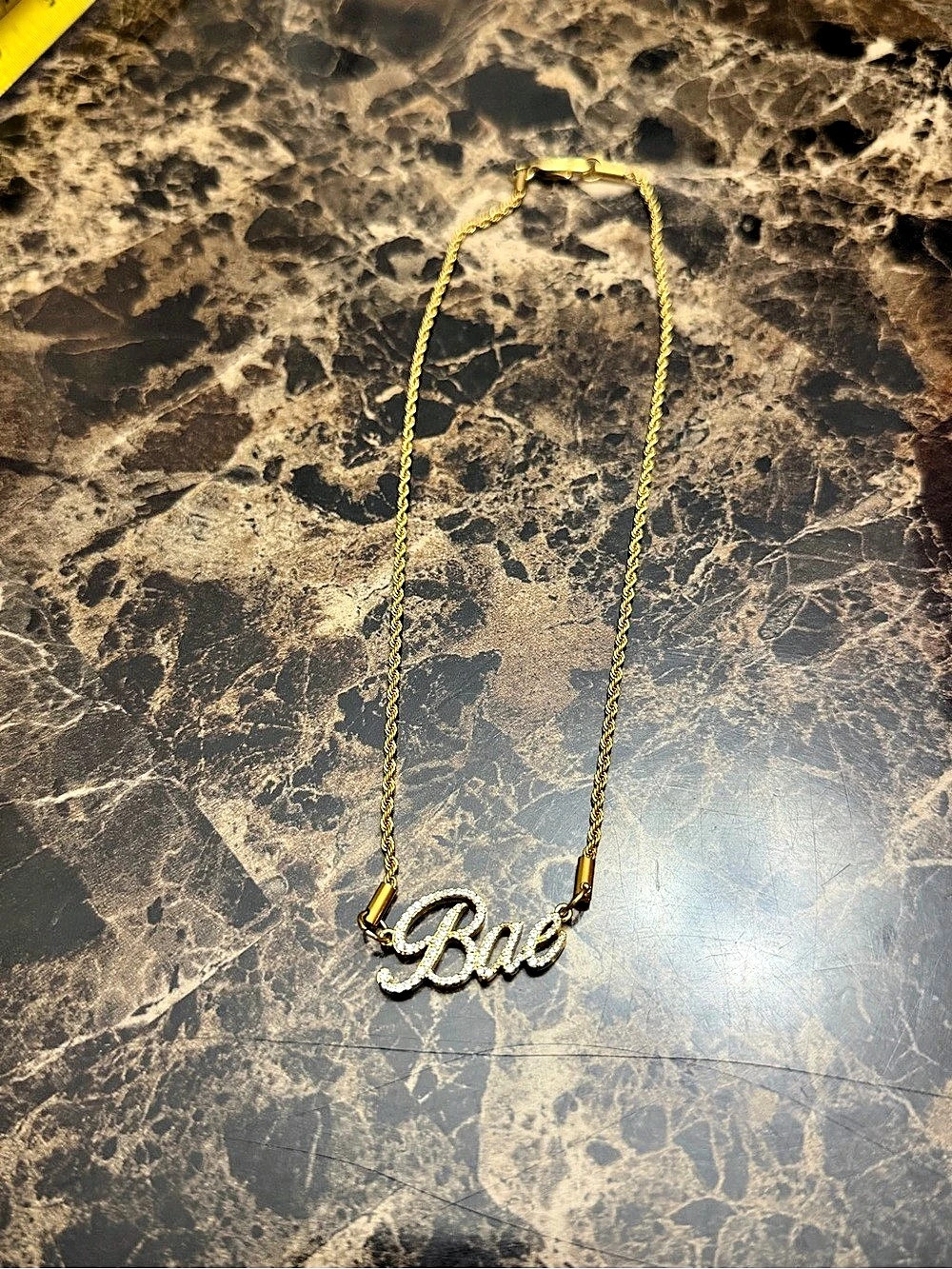 "bae" gold chain with clear cubic zirconia rhinestones and 18kp
